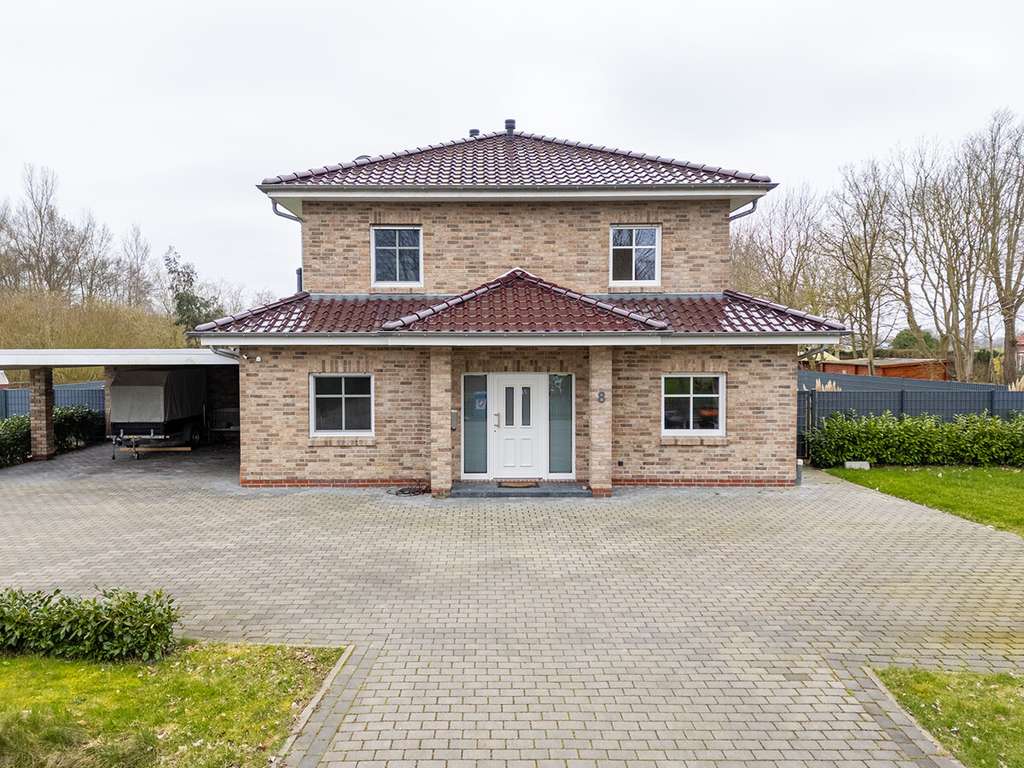 Immobilie in Westerholt - Traumhafte Stadtvilla mit großem Garten in idyllischer Lage - Bild 3