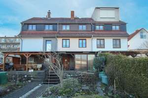 Renovierungsbedürftiges Reihenmittelhaus mit Terrasse und Stellplatz – 5 Zimmer auf ca. 70 m²