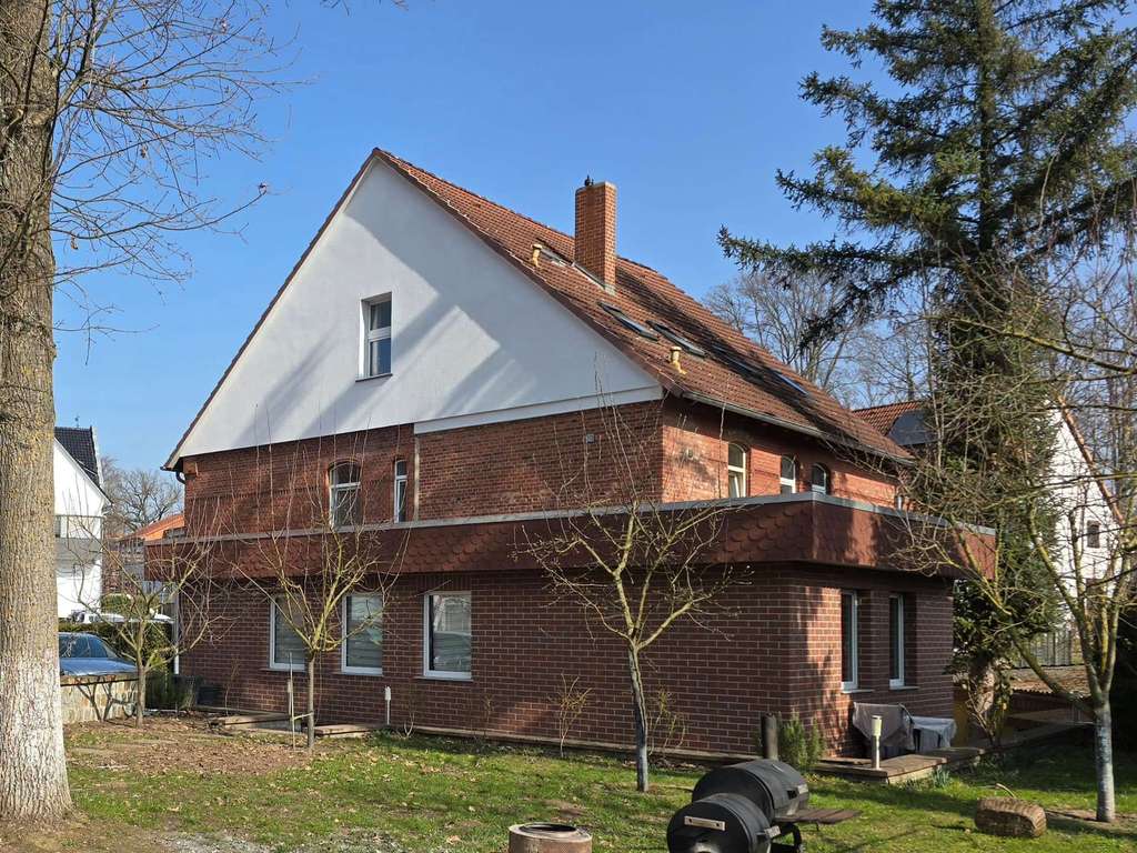 Immobilie in Apelern - Attraktive Kapitalanlage: 4 vermietete Wohneinheiten mit Garten und Stellplätzen in Apelern - Bild 1