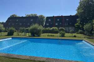 Geräumiges Reihenmittelhaus auf pflegeleichtem Grundstück mit Sauna und Gemeinschaftspool