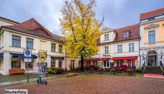 Bild von Wohn- und Geschäftshaus als Kapitalanlage