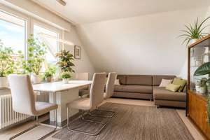 Exklusives Angebot für Kapitalanleger: Vermietete Dachgeschosswohnung mit Balkon & Stellplatz