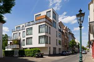 Penthouse-Wohnung mit großer Sonnenterrasse und direktem Aufzugzugang in Rheinnähe