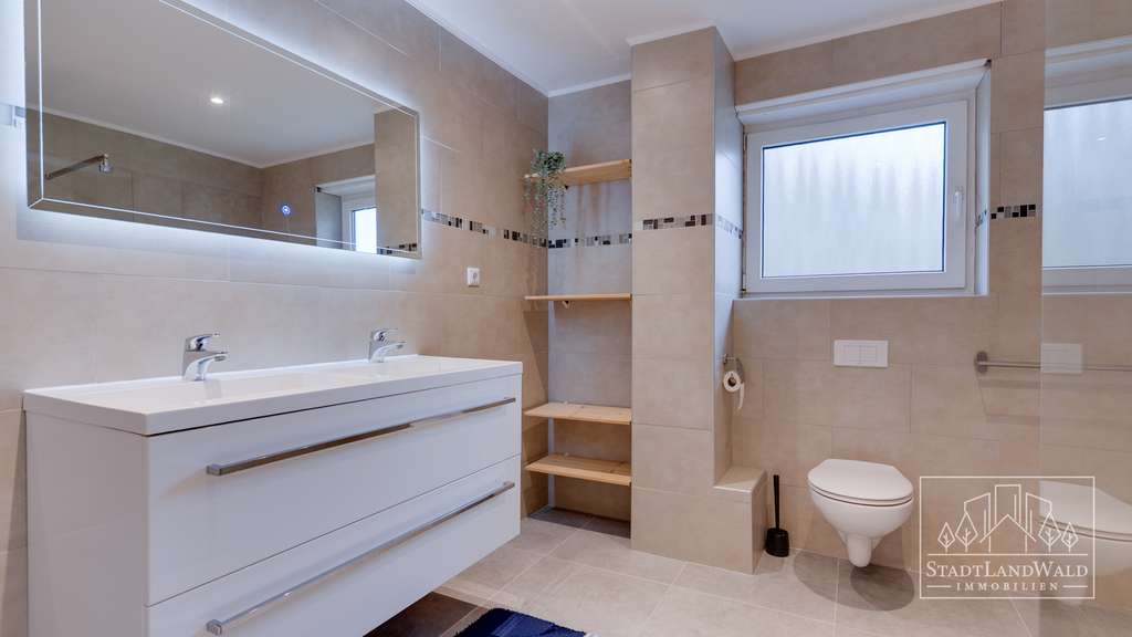 Immobilie in Höheischweiler - Einziehen und wohlfühlen – Gepflegtes Einfamilienwohnhaus mit Sonnenterrasse und Blick ins Grüne - Bild 2