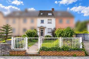 Reihenmittelhaus mit Doppelgarage & Fernwärme – viel Potenzial in MA-Käfertal
