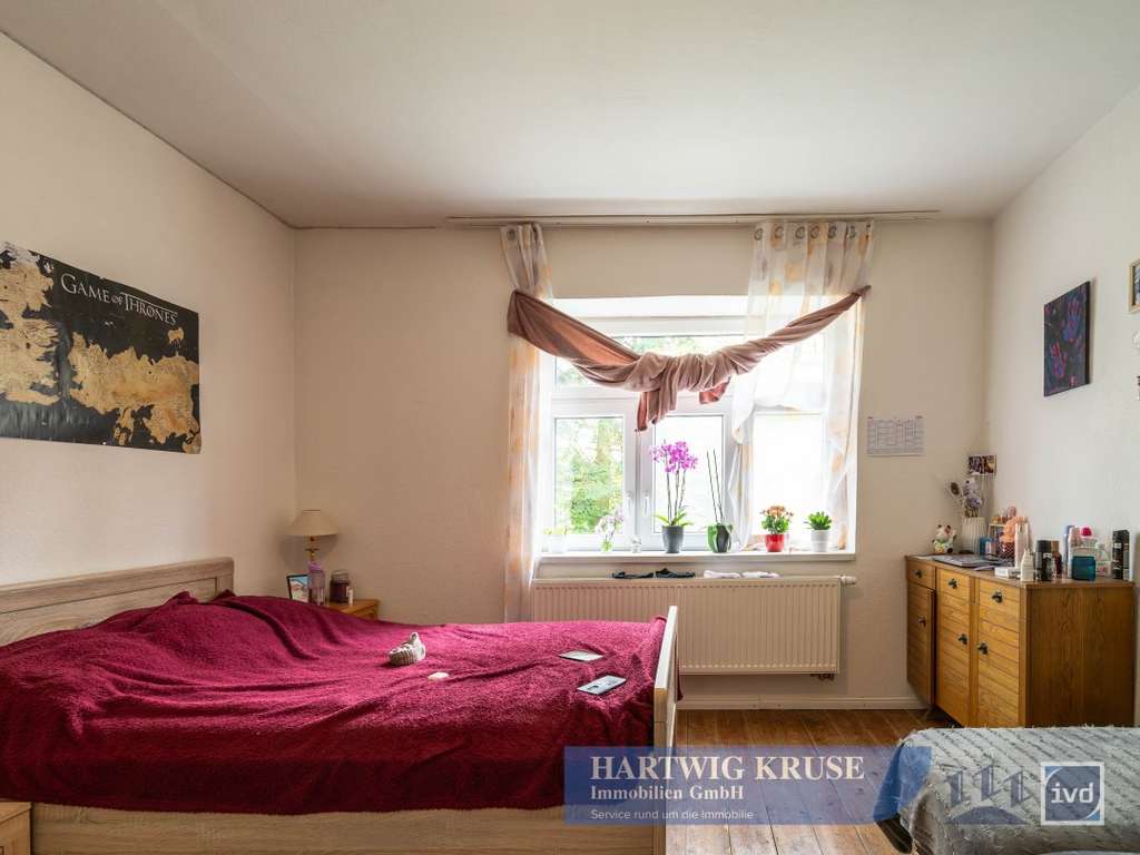 Immobilie in Drochtersen - Vermietetes Einfamilienhaus in ruhiger Lage mit großem Grundstück und Entwicklungspotenzial - Bild 4