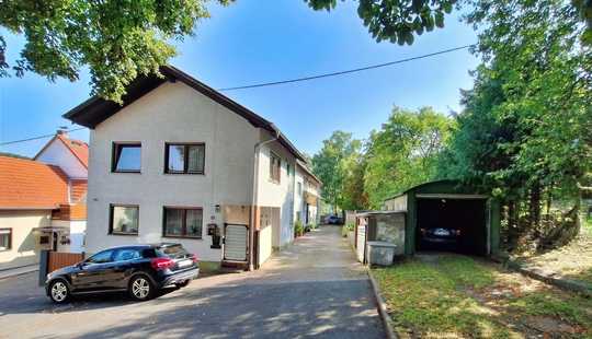 Bild von Einfamilienhaus mit Anbau, Lagerfläche und Doppelgarage!
