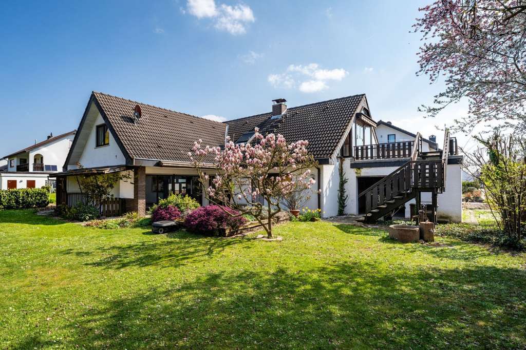 Immobilie in Biblis - Einfamilienhaus in Biblis - Großzügiges Wohnen auf 203 m² mit viel Platz für die ganze Familie - Bild 4