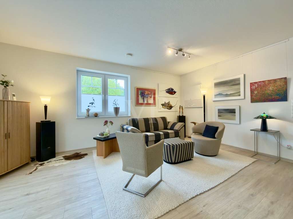 Immobilie in Sögel - Moderner Wohnkomfort trifft auf durchdachtes Design – neuwertige Erdgeschosswohnung in ruhiger Lage - Bild 2