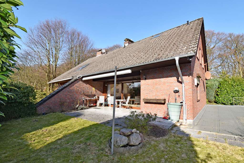 Immobilie in Wohltorf - Perfekt für die kleine Familie: Gut geschnittene DHH mit offener Architektur auf sonnigem Grundstück - Bild 0