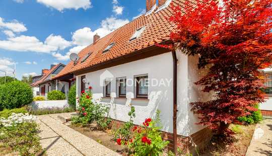 Bild von Blick ins Grüne: Charmante Doppelhaushälfte mit Ausbaureserve, Garage, Terrasse und viel Potenzial