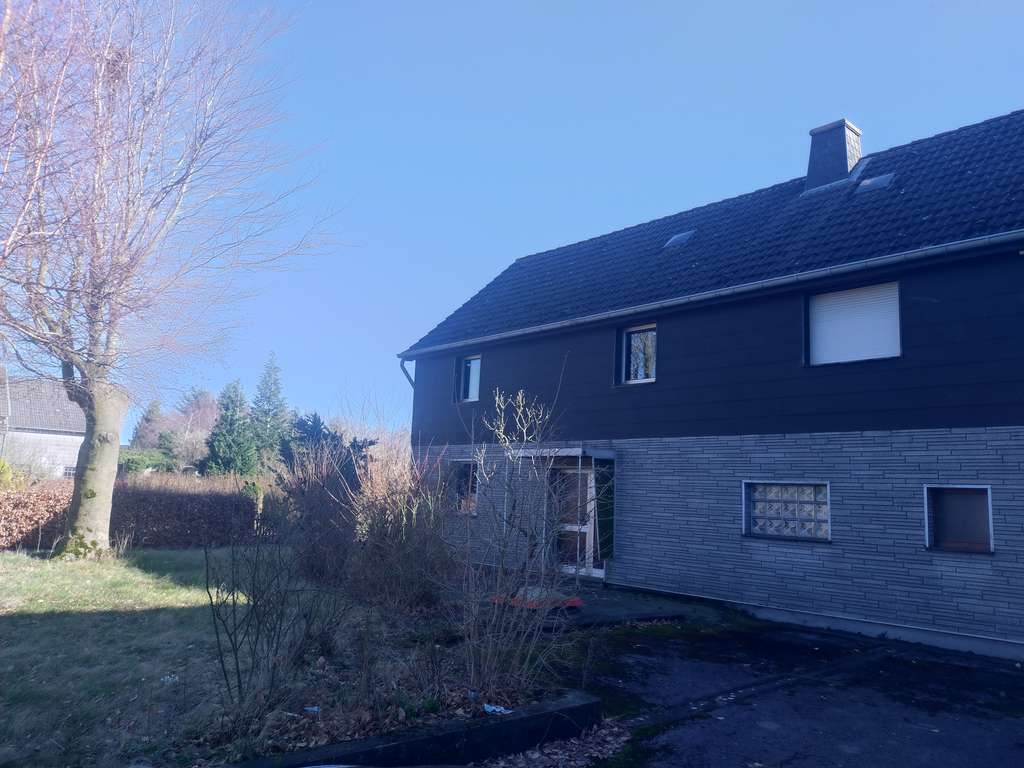 Immobilie in Hürtgenwald - Zweifamilien-Doppelhaushälfte, eine Wohnung fertig, eine Wohnung ausbaureif - somit dann neu!!! - Bild 2