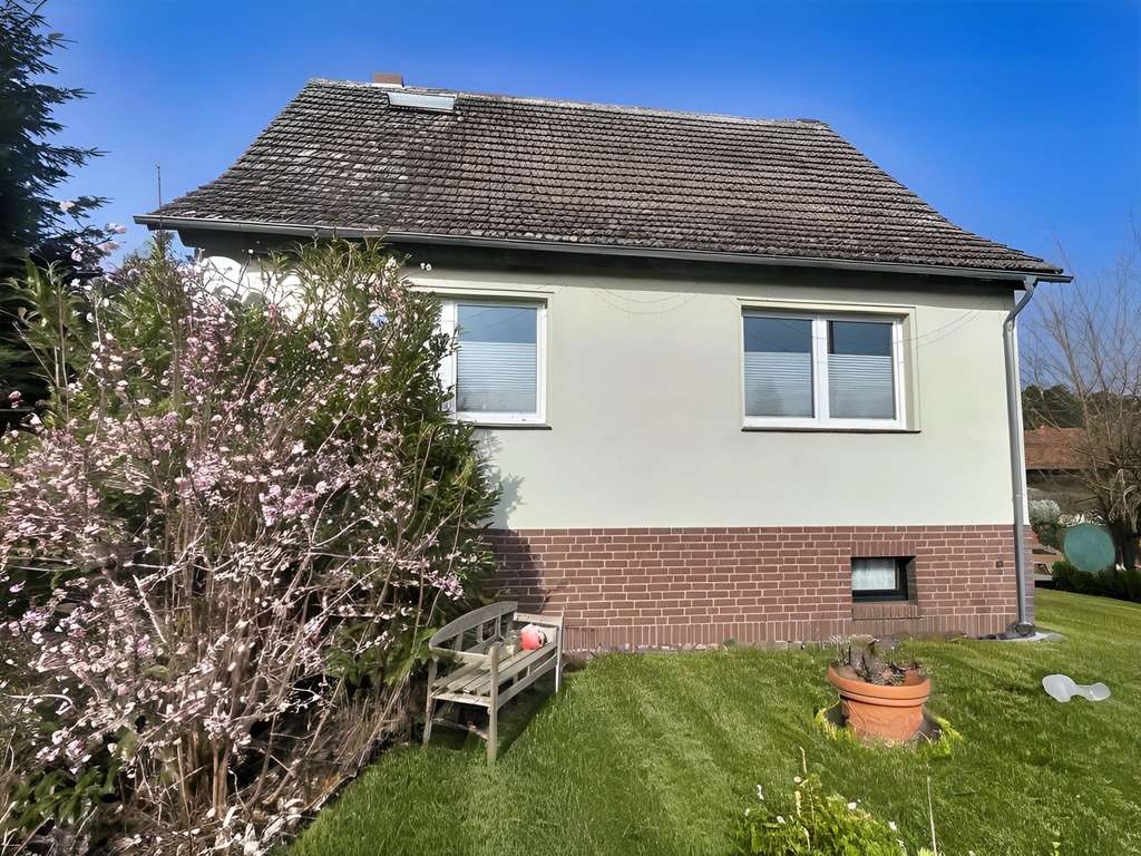 Immobilie in Ludwigslust - Charmantes Einfamilienhaus mit großem Grundstück und vielseitigen Möglichkeiten - Bild 1