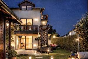 Das Hausgefühl in Bogenhausen – Gartenwohnung mit Souterrain!