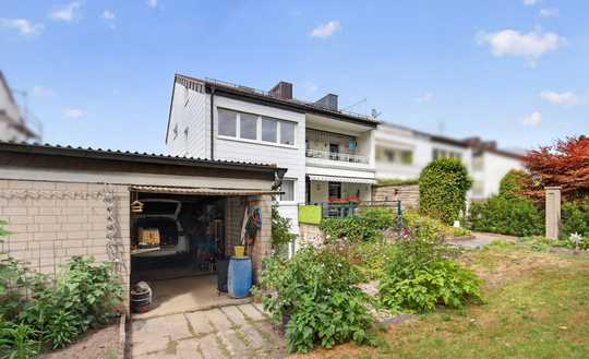Solide Kapitalanlage in gefragter Karlsruher Wohnlage - 4-Familienhaus mit 2 Garagen