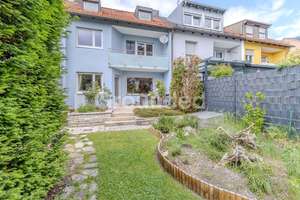 Gepflegtes Reihenmittelhaus mit großem Garten und Garage in Nürnberg – Die vollständige Adresse der Immobilie erhältst du vom Anbieter., 90439 Sankt Leonhard, Nürnberg – Vorschaubild 2