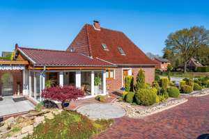 Modernisierter Bungalow mit Wintergarten und großem Garten in Augustfehn II – Die vollständige Adresse der Immobilie erhältst du vom Anbieter., 26689 Apen – Vorschaubild 2