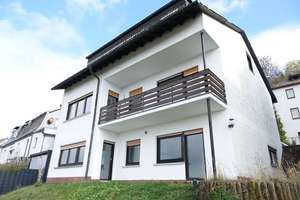 Großzügiges Mehrfamilienhaus in Traumlage von Schmitten-Oberreifenberg zu vermieten – Hochstraße 18, 61389 Schmitten – Vorschaubild 1
