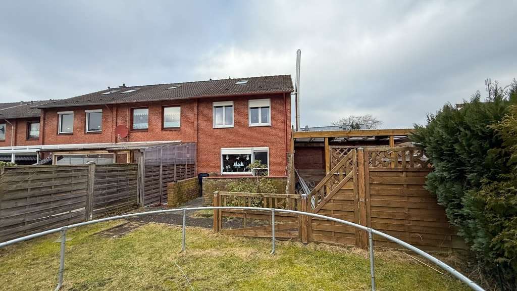Immobilie in Jerrishoe - Vollständig unterkellertes Reihenendhaus mit Carport, Terrasse und Gartenhaus in Tarp - Bild 1