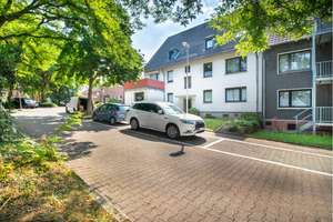 Zwei Einheiten! Erdgeschosswohnung mit Garage, Balkon & separates Souterrain Appartement
