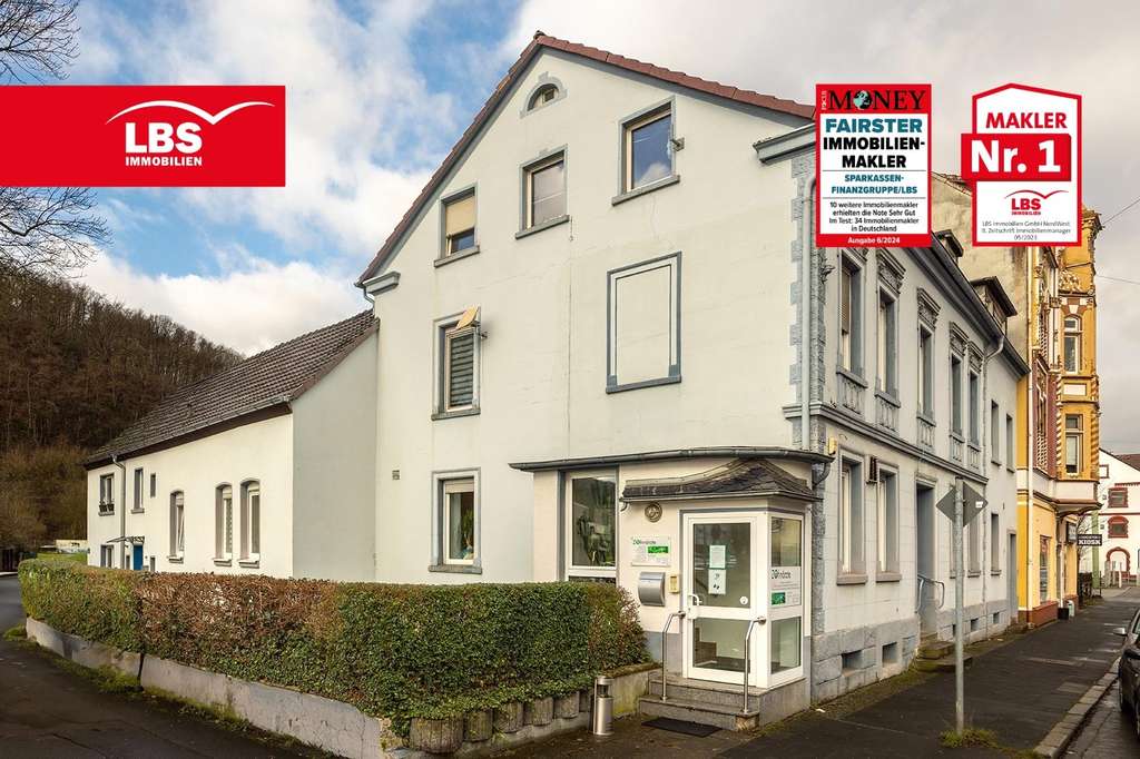 7-Parteien Mehrfamilienhaus mit Arztpraxis und 4 Garagen Ist-Faktor 10,3