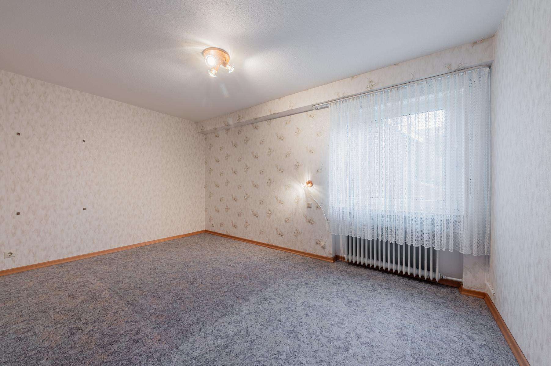 Immobilie in Altweidelbach - Großzügiger Bungalow mit Garage, möglicher Einliegerwohnung und pflegeleichter Grünfläche - Bild 9