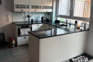 2-Zimmer-Wohnung mit großzügiger Wohnküche, Kaminofen & hochwertigem Bad