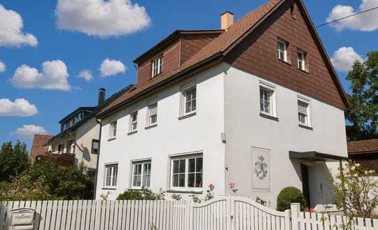 Raum für Generationen, Rendite und Ideen – Gepflegtes Mehrfamilienhaus mit Garten