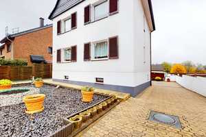 Gemütliches Ein-/ Zweifamilienhaus mit großzügigem Gartengrundstück und 2 Garagen in Hilden-Ost – Walder Straße 388, 40724 Mettmann (Kreis) – Vorschaubild 1