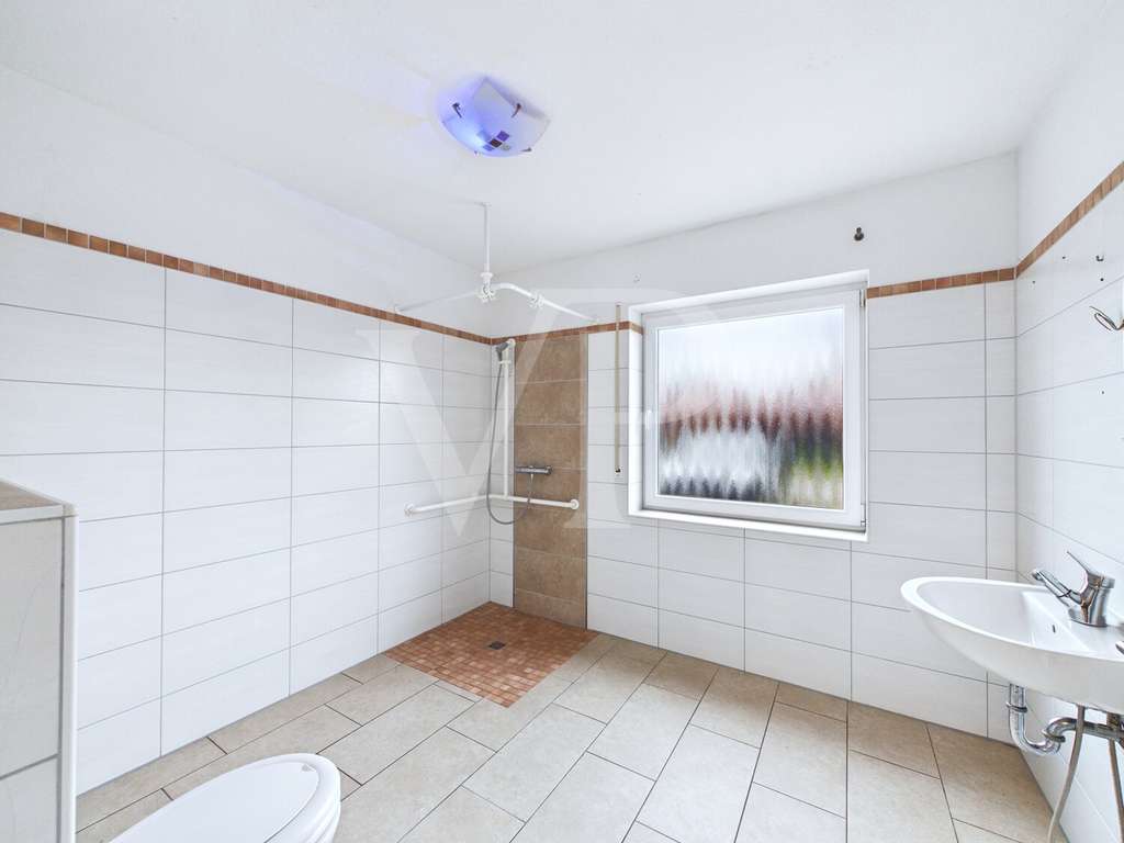 Immobilie in Ihlow - Doppelhaushälfte in Ochtelbur - mit Ausbaupotenzial! - Bild 4