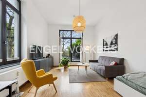 Modernes Wohnen im historischen Altbau 
Stilvolles Terrassenapartment mit Garten