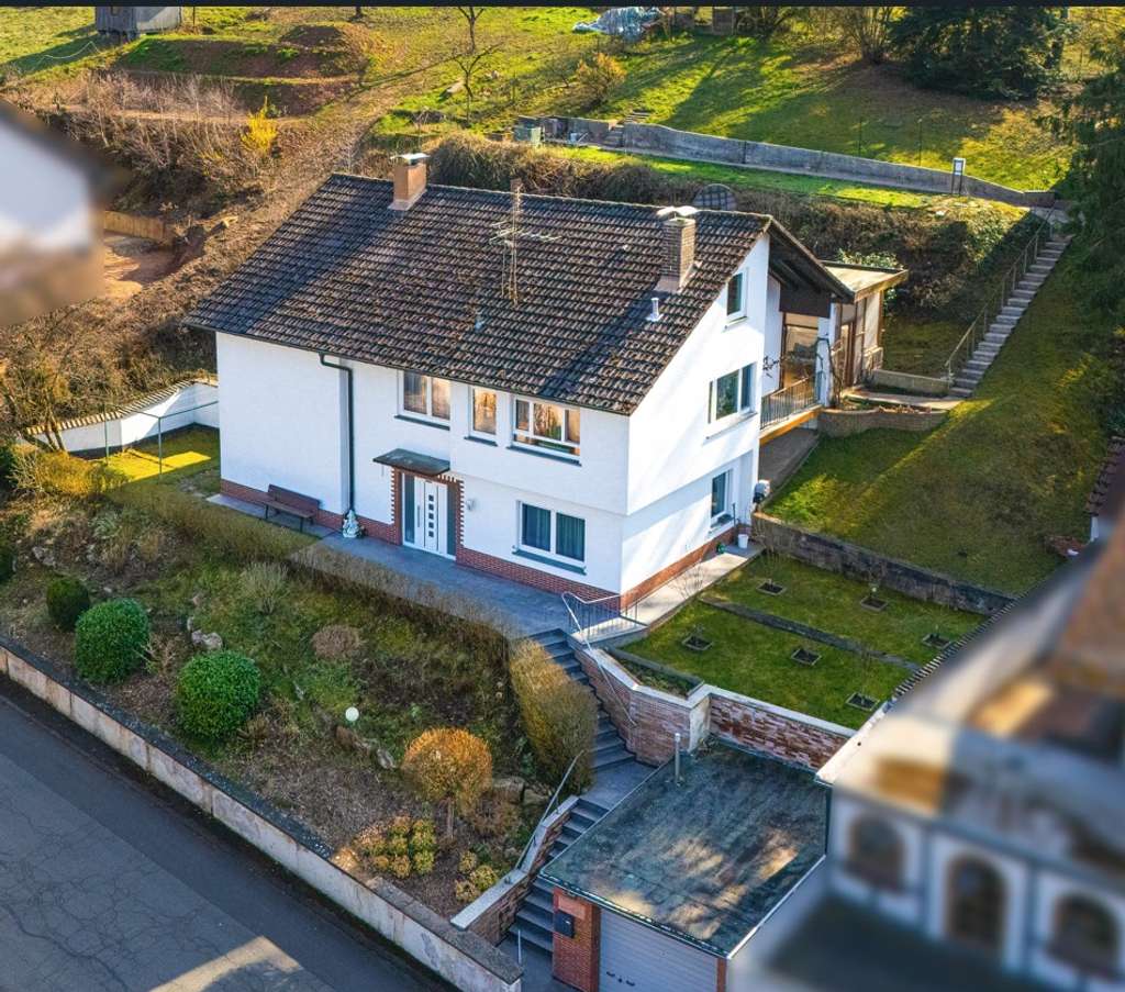 Immobilie in Leidersbach - ++Gepflegtes EFH in ruhiger Ortsrandlage mit Einliegerwohnung, schönem Garten und Garage ++ - Bild 0