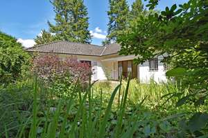 Verwunschenes Juwel in gefragter Lage: Charmantes Landhaus mit Optionen auf ca. 1.700 m² Grundstück