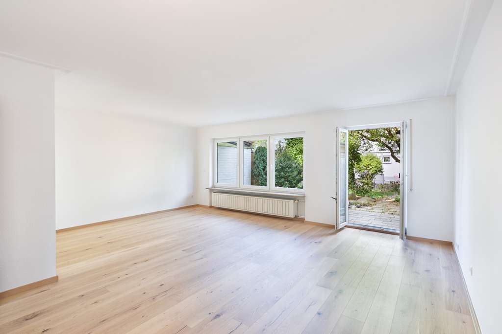 Immobilie in Ismaning - Bezugfreies Reihenmittelhaus mit Garten in begehrter Lage an den Isarauen - Bild 1