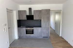 Erstbezug | hochwertige 2-Zimmer Terrassenwohnung  | Einbauküche | Stellplatz | KFW55 | ER-Zentrum