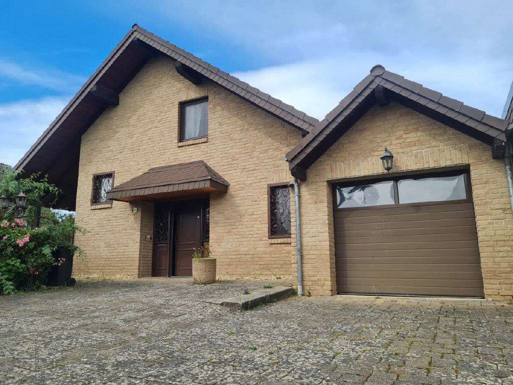 Solides Einfamilienhaus mit Wintergarten, Sauna und Gartenidyll!