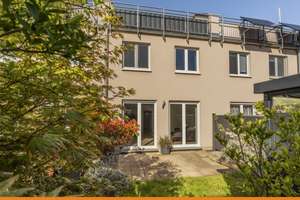 Modernes Reihenmittelhaus mit Garten und Dachterrasse