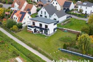 Ideal für Familien - großes Grundstück mit modernem Haus! – Die vollständige Adresse der Immobilie erhältst du vom Anbieter., 97332 Volkach – Vorschaubild 2