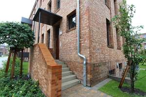 Großzügige 2-Zimmer-Wohnung mit Terrasse in der ehem. Glanzfilmfabrik!