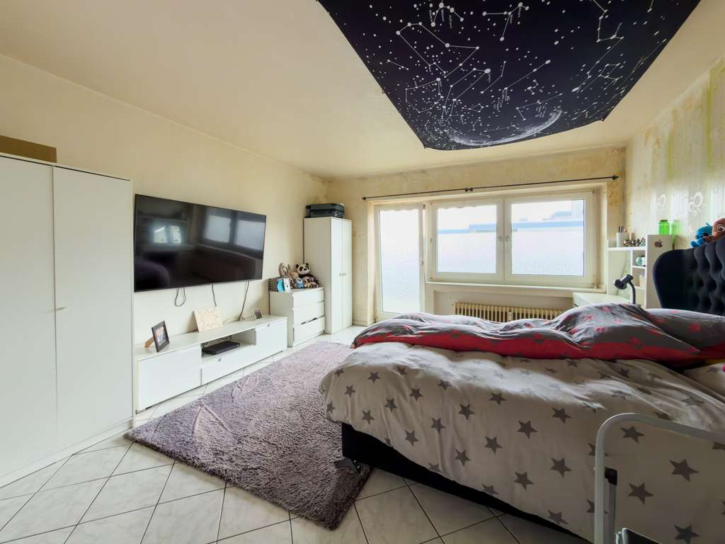 Immobilie in Übach-Palenberg - 4-Zimmer-Wohntraum 2. OG – Balkon, Spielplatz, individuelle Gestaltung & sichere Miete - Bild 1