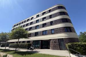 Neubau-Erdgeschosswohnung mit privatem Süd-West-Garten in Baumkirchen Mitte