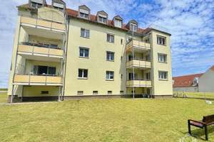Großzügige Familienwohnung mit Sonnenbalkon und Gartenmitbenutzung