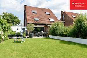Stilvoll sanierte Doppelhaushälfte mit Wärmepumpe, Klimaanlagen, Designküche und traumhaftem Garten