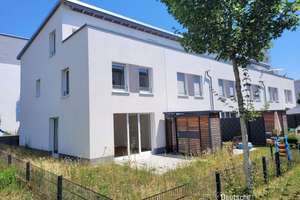 Reiheneckhaus mit Garten, Dachterrasse und Tiefgaragenstellplatz (ohne Keller)