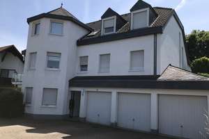 3-Zimmer-Wohnung mit Garten, Terrasse und Garage Balkon 