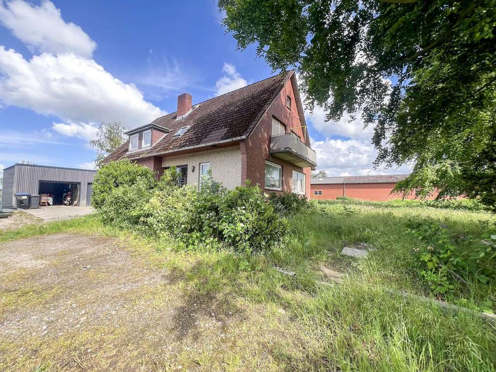 Immobilie in Stade - Zwei Objekte auf einem großzügigen 4.800 m² Baugrundstück mit Entwicklungspotenzial - Bild 1