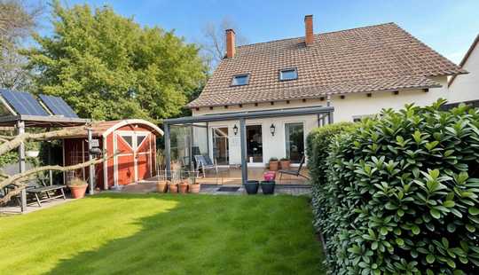 Bild von Wohlfühlhaus mit Kaminofen, Wintergarten & nachhaltiger Luftwärmepumpe