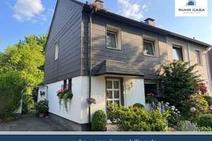 Doppelhaushälfte mit schönem Garten in Alstaden – Garage, Fernwärme & Entwicklungspotenzial