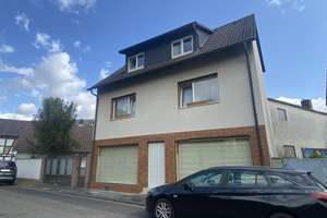 Wohn-/Geschäftshaus (2 Wohnungen und Ladengeschäft) mit Doppelgarage in ruhiger Lage von Mainhausen – Die vollständige Adresse der Immobilie erhältst du vom Anbieter., 63533 Mainhausen – Vorschaubild 2