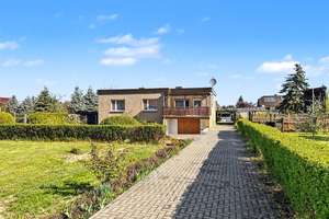 Einfamilienhaus mit großem Grundstück und Garage in Mühlberg Elbe – Die vollständige Adresse der Immobilie erhältst du vom Anbieter., 4931 Mühlberg/Elbe – Vorschaubild 1